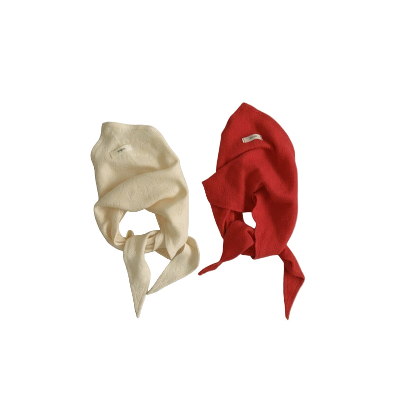 Beige and red headbands on a gray background